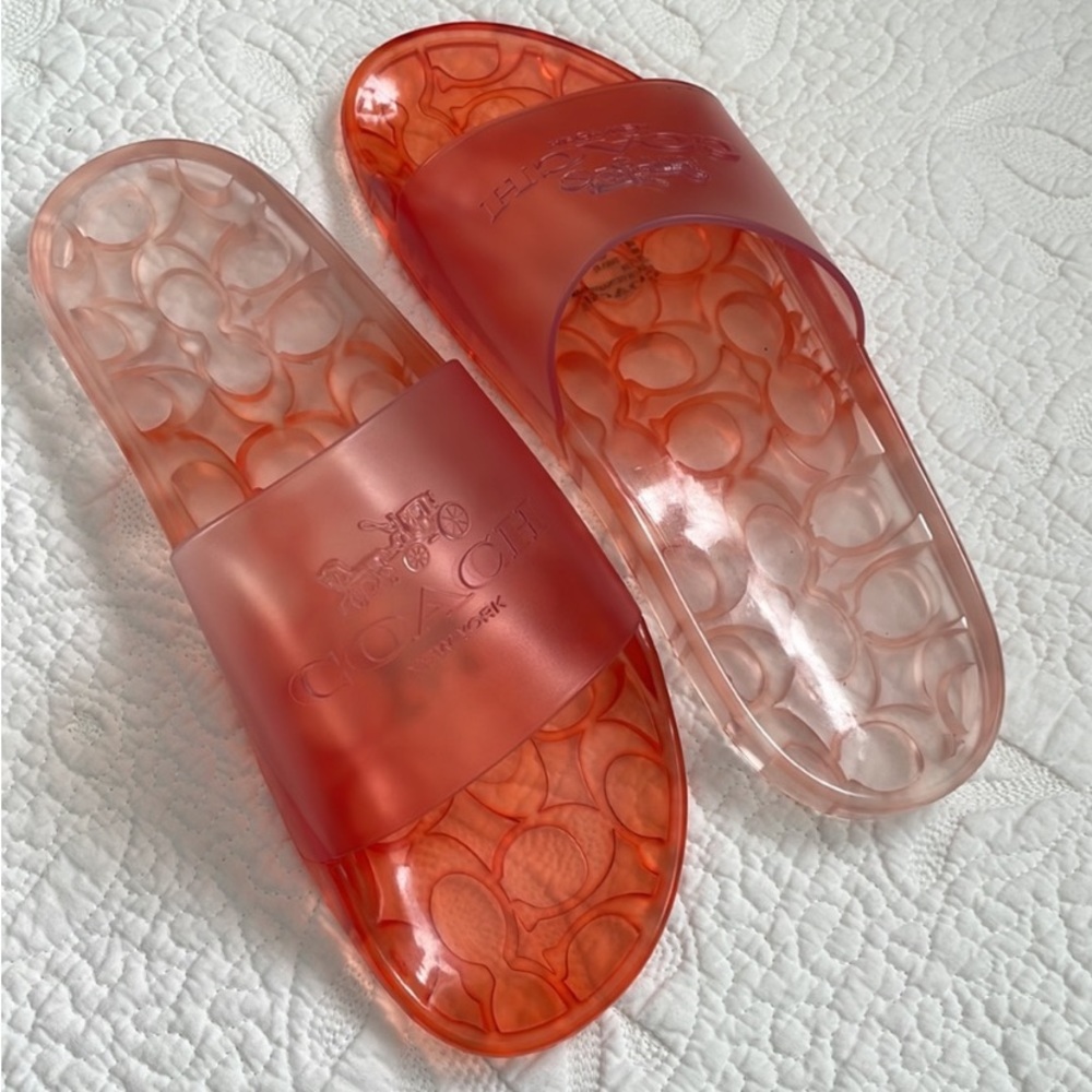 COACH ULYSSA RUBBER SLIDE
TANGERINE